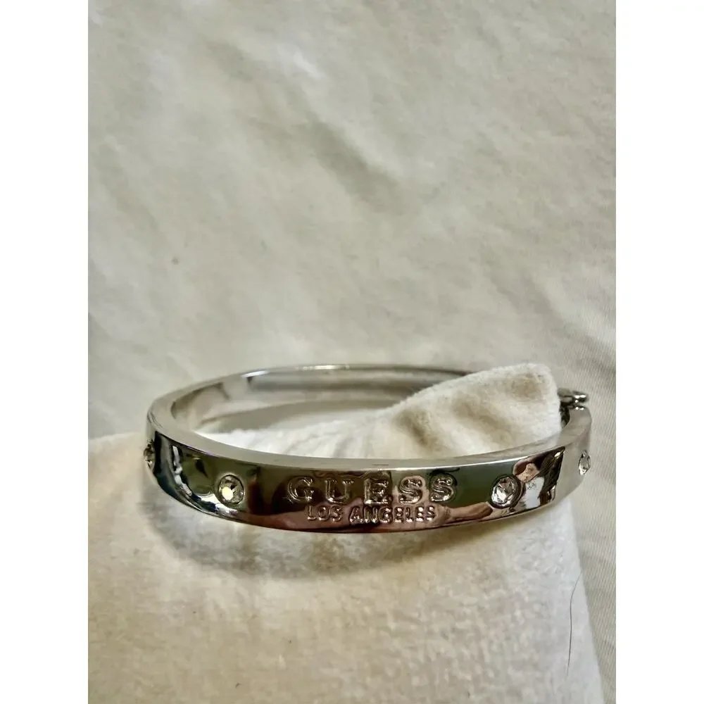 Guess silver logo